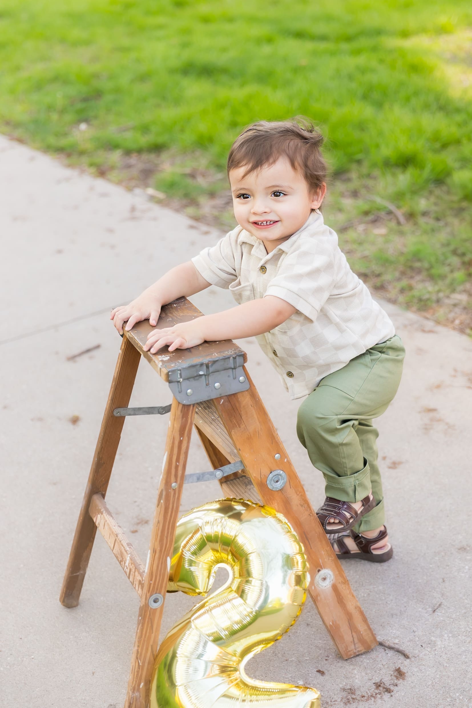 Playful toddler portrait at Pittsburg State University in Pittsburg, KS