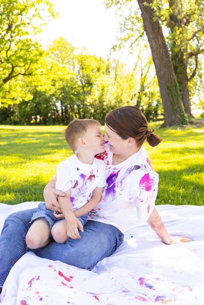 Fun summer painting activity with mom and son snuggles during mom and me photoshoot in pittsburg ks