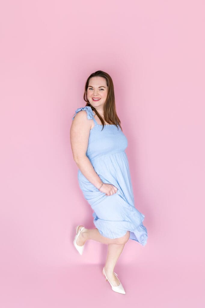 Small business owner dancing during brand photoshoot in pittsburg ks