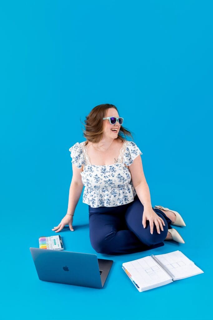 business owner smiling during brand photoshoot with joplin Mo photographer