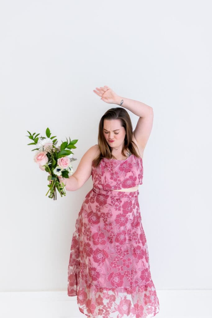 Small business owner dancing during brand photoshoot in joplin mo